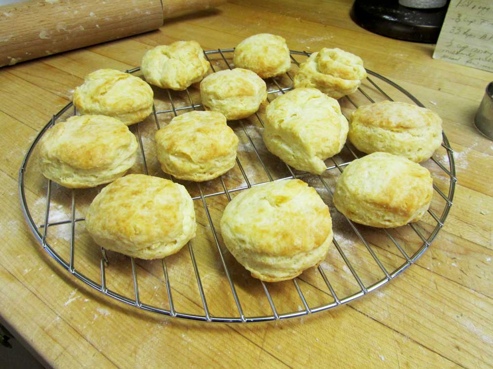 Image of baked tea biscuits on a cooling rack